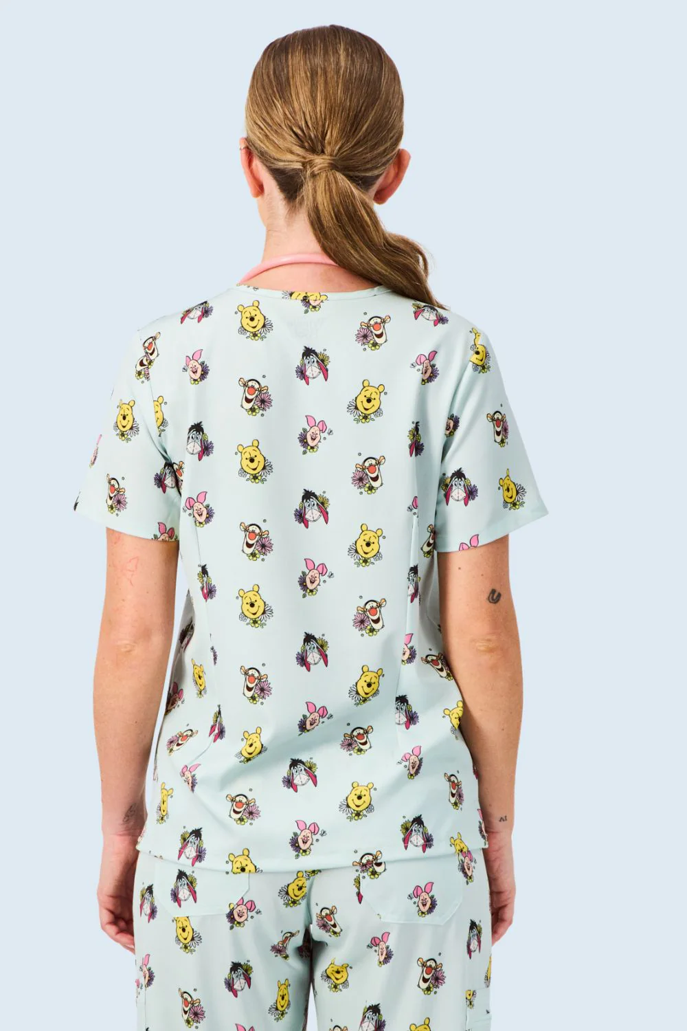 Disney’s Winnie the Pooh and Friends Women’s 3-Pocket Scrub Top, Flower Patch - Image 5