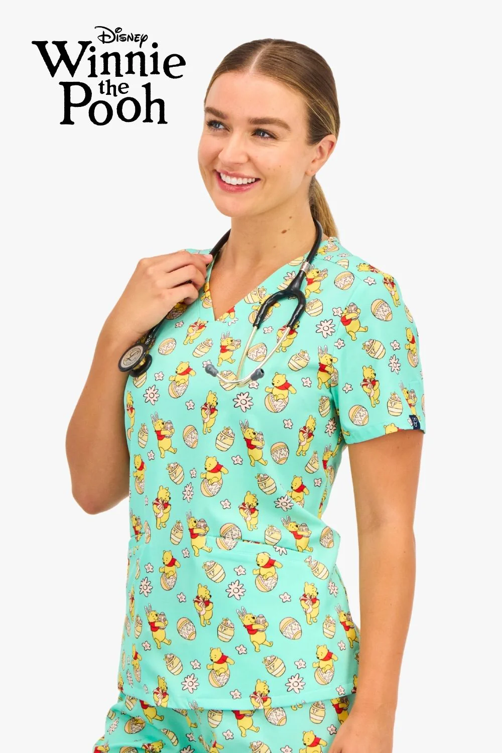 Disney’s Winnie the Pooh Women’s 3-Pocket Scrub Top, Easter Egg Hunt